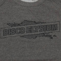 Gray t-shirt with ’DISCO ELYSIUM’ printed in a distressed, blocky font.