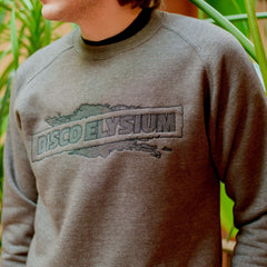 Gray sweatshirt with ’DISCO ELYSIUM’ printed on the front.