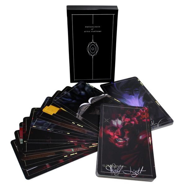 Deck of dark-themed tarot or oracle cards with a black box.