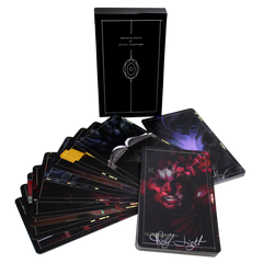 Deck of dark-themed tarot or oracle cards with a black box.